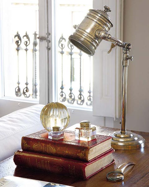 Room, Metal, Brass, Lamp, Interior design, Home accessories, Still life photography, Cylinder, Bronze, Living room, 