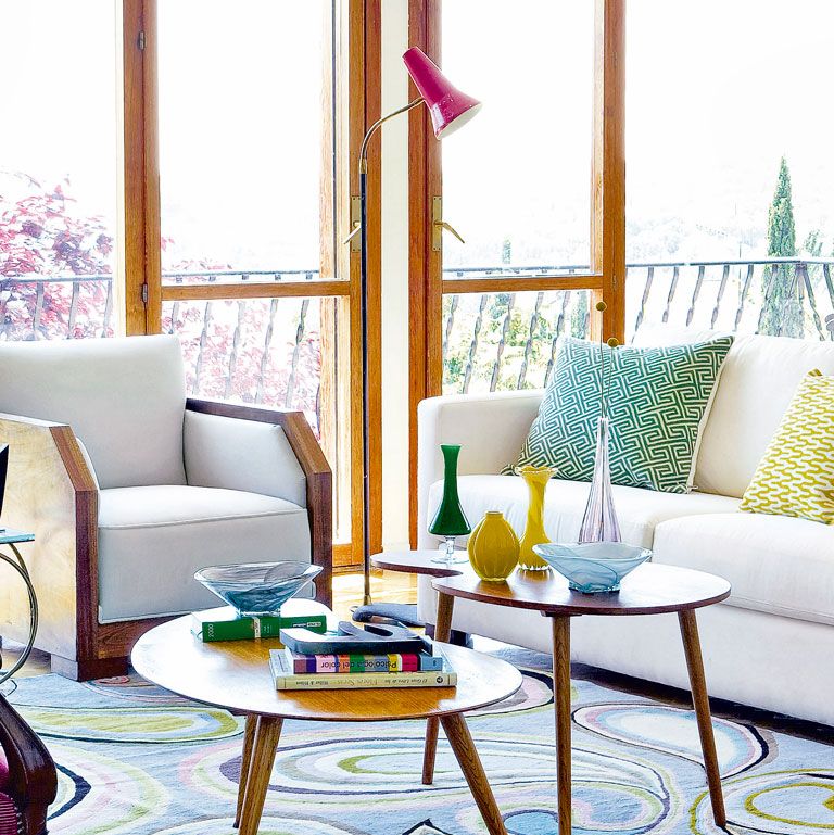 living room with colored wooden coffee table colorful vases