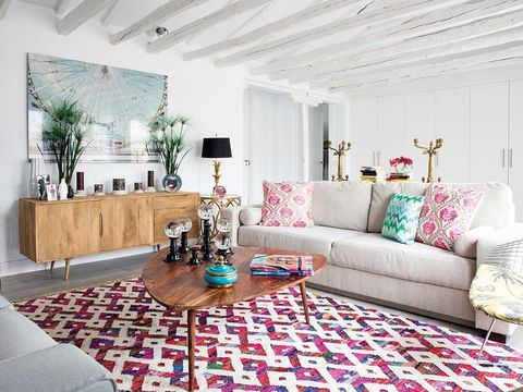 Living room, Furniture, Room, Interior design, Property, Coffee table, Table, Pink, Home, Couch, 