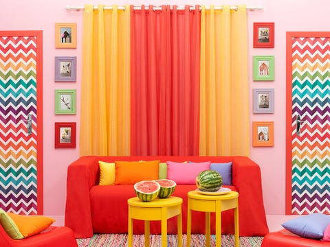 Room, Interior design, Yellow, Green, Orange, Furniture, Textile, Living room, Wall, Colorfulness, 