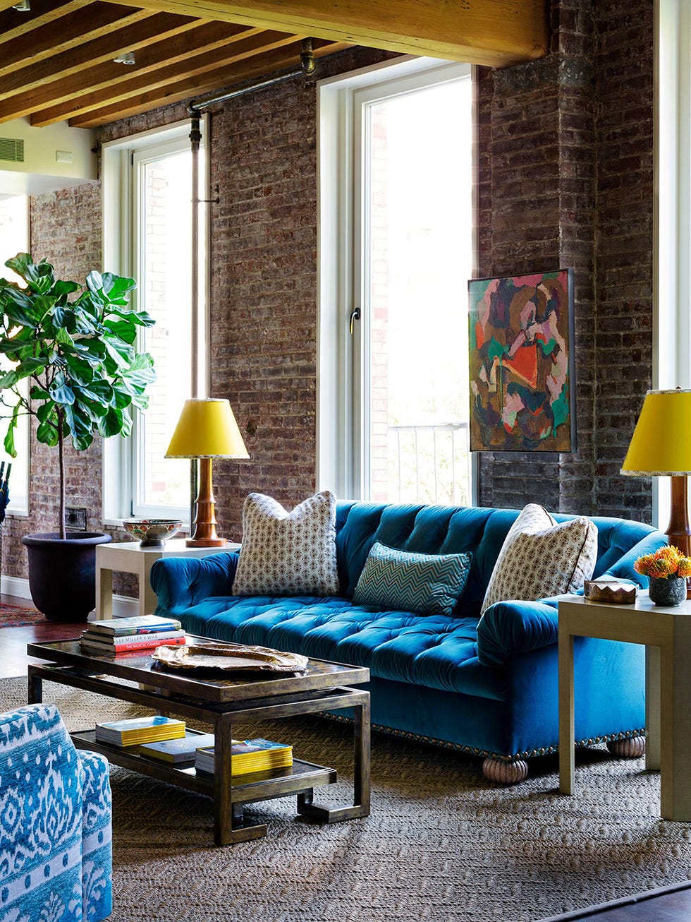 Blue, Room, Interior design, Yellow, Living room, Furniture, Couch, Wall, Floor, Table, 