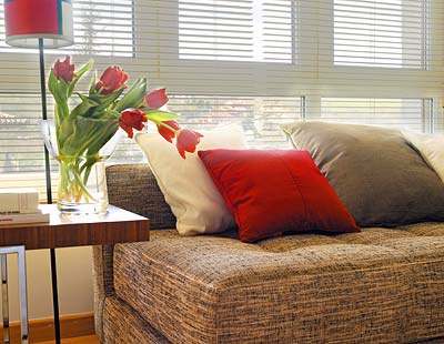 Room, Interior design, Wood, Property, Textile, Window covering, Red, Wall, Furniture, Flower, 