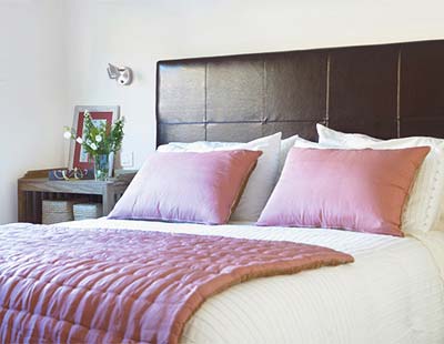 Bed, Room, Interior design, Wood, Brown, Wall, Bedding, Property, Bedroom, Textile, 