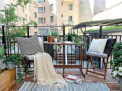 Home, Chair, Outdoor furniture, Balcony, Pillow, Linens, Armrest, Design, Patio, Throw pillow, 