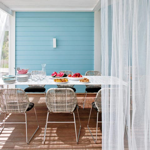 Interior design, Table, Furniture, Room, Window covering, Window treatment, Teal, Home, Outdoor table, Outdoor furniture, 