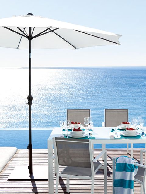 Tablecloth, Furniture, Table, Umbrella, Ocean, Linens, Outdoor furniture, Azure, Chair, Sea, 