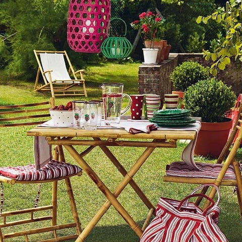 Furniture, Outdoor furniture, Flowerpot, Table, Outdoor table, Easel, Garden, Houseplant, Folding chair, Backyard, 