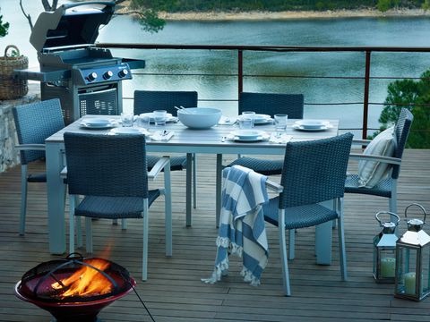 Table, Furniture, Outdoor table, Outdoor furniture, Chair, Linens, Restaurant, Home accessories, Lantern, Heat, 