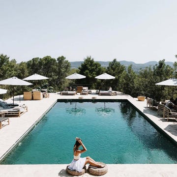Swimming pool, Leisure, Resort, Sunlounger, Vacation, Outdoor furniture, Umbrella, Shade, Composite material, Resort town, 