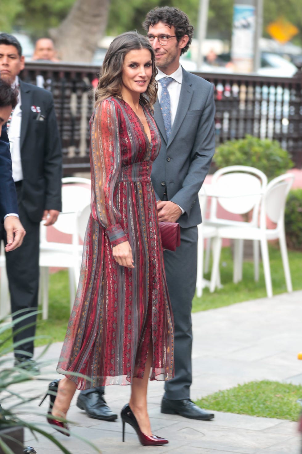 Clothing, Suit, Dress, Fashion, Formal wear, Event, Outerwear, Footwear, Gown, Street fashion, 