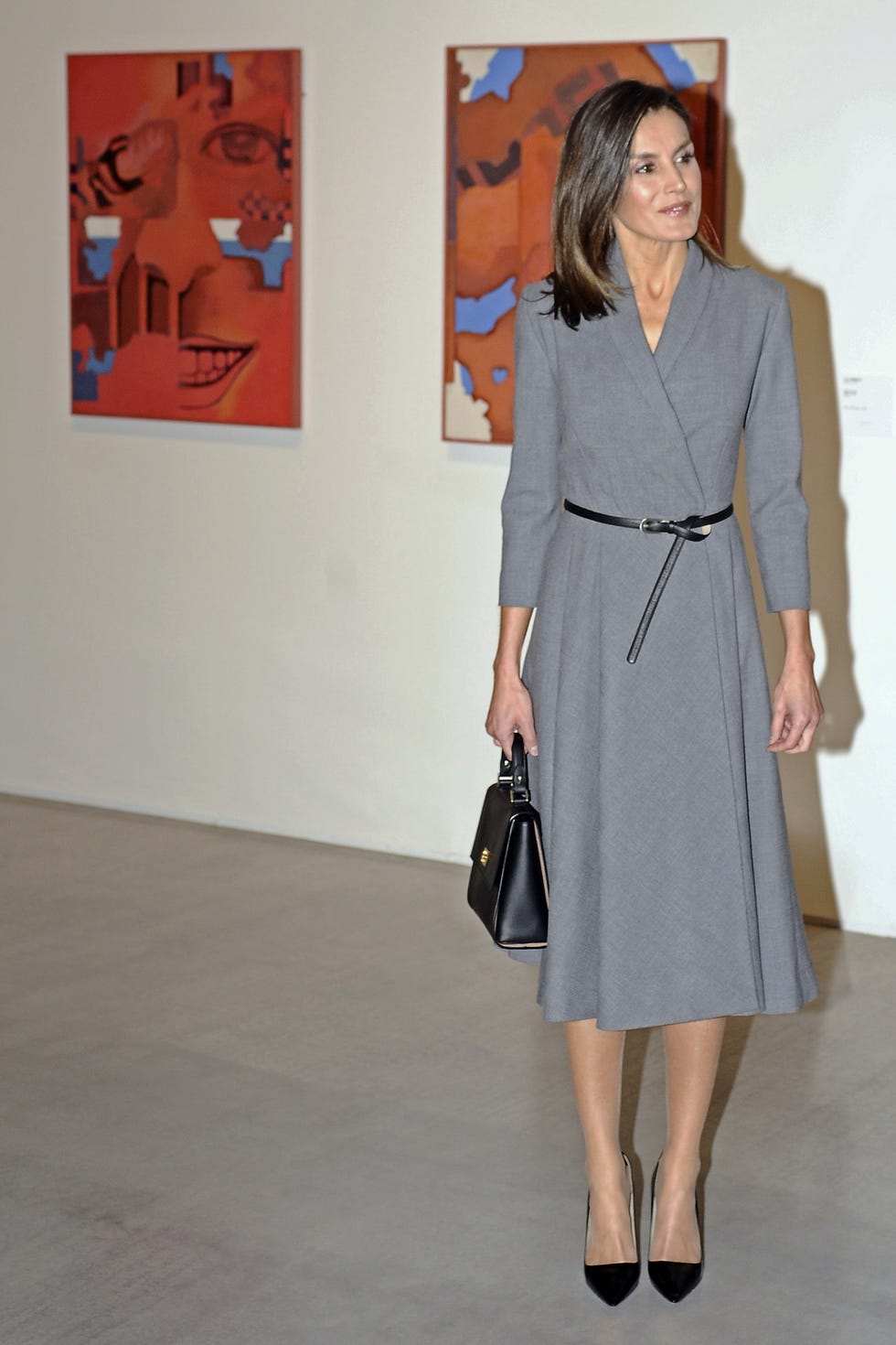 Clothing, Fashion, Dress, Shoulder, Fashion model, Footwear, Fashion show, Outerwear, Beige, Joint, 