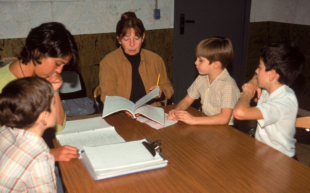 Hair, Head, Table, Office supplies, Writing implement, Education, Office equipment, Sharing, Learning, Stationery, 