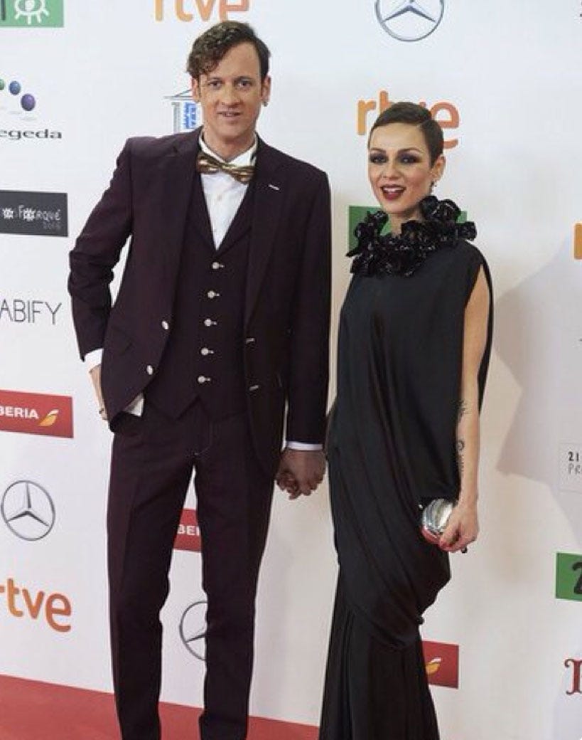Clothing, Coat, Trousers, Shirt, Flooring, Outerwear, Suit, Formal wear, Dress, Collar, 