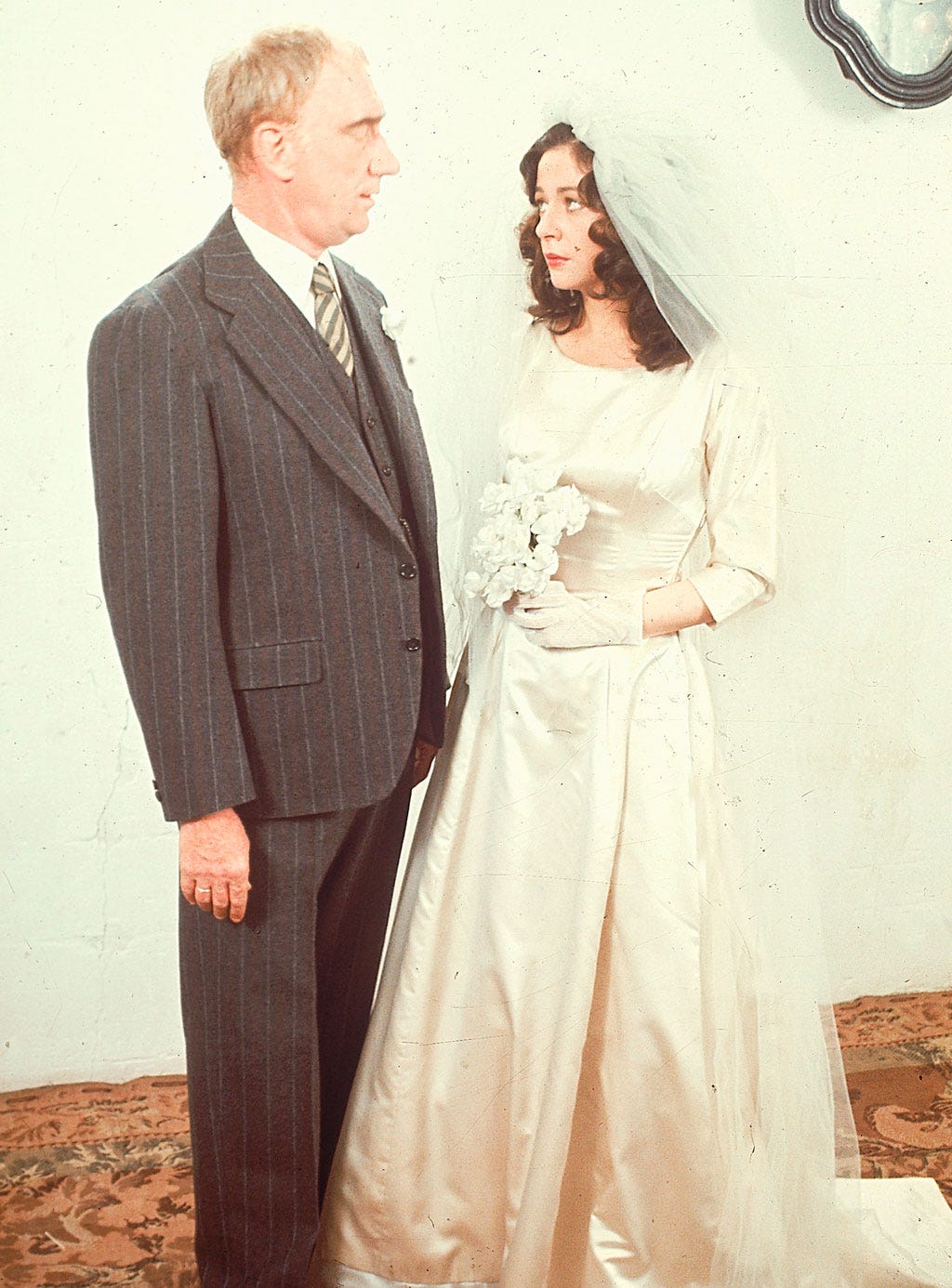 Clothing, Hair, Trousers, Coat, Standing, Photograph, Outerwear, Dress, Bridal clothing, Formal wear, 