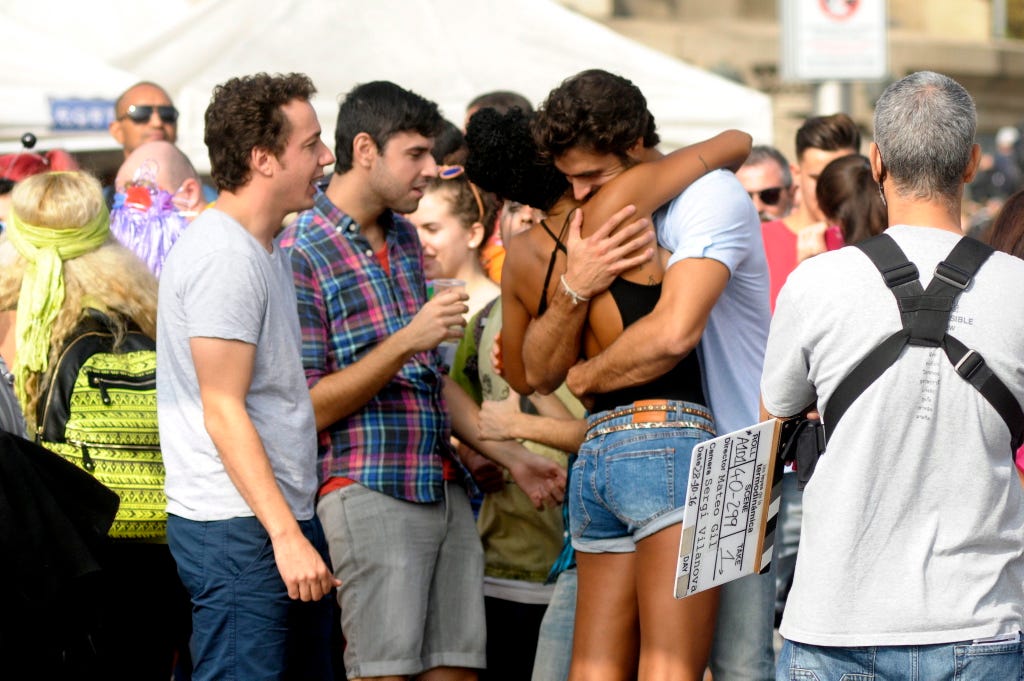 Hair, Crowd, Denim, Interaction, Tourism, Luggage and bags, Bag, jean short, Backpack, Handbag, 
