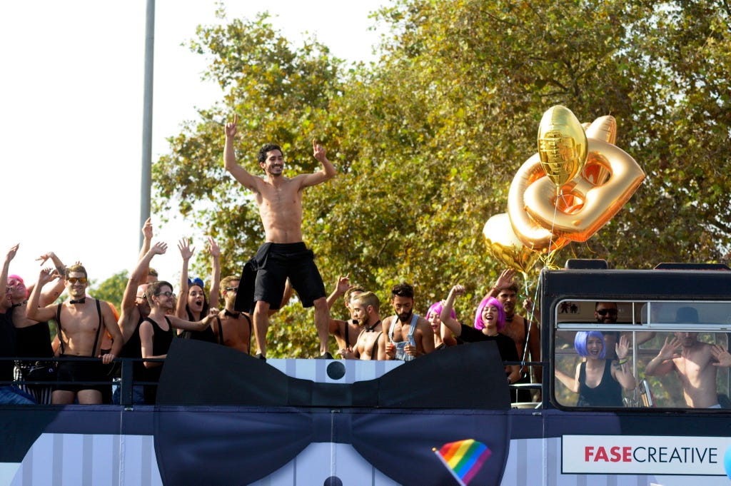 Display device, Crowd, Public event, Audience, Celebrating, Multimedia, Barechested, Cheering, Balance, Block party, 