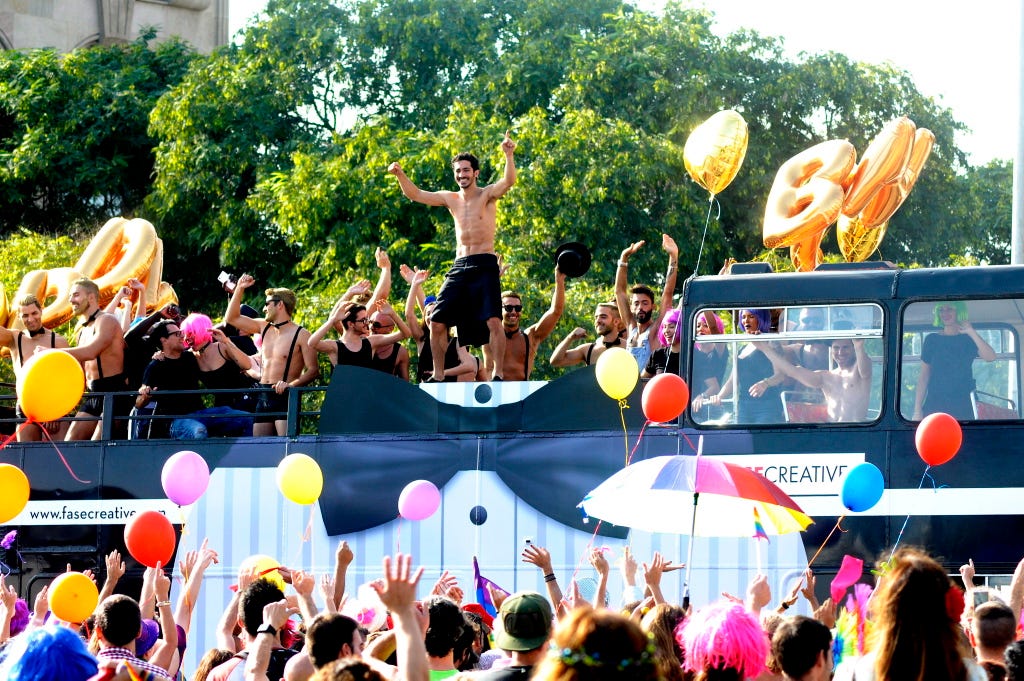Crowd, Event, Entertainment, Pink, Party, Block party, Balloon, Public event, Magenta, Audience, 