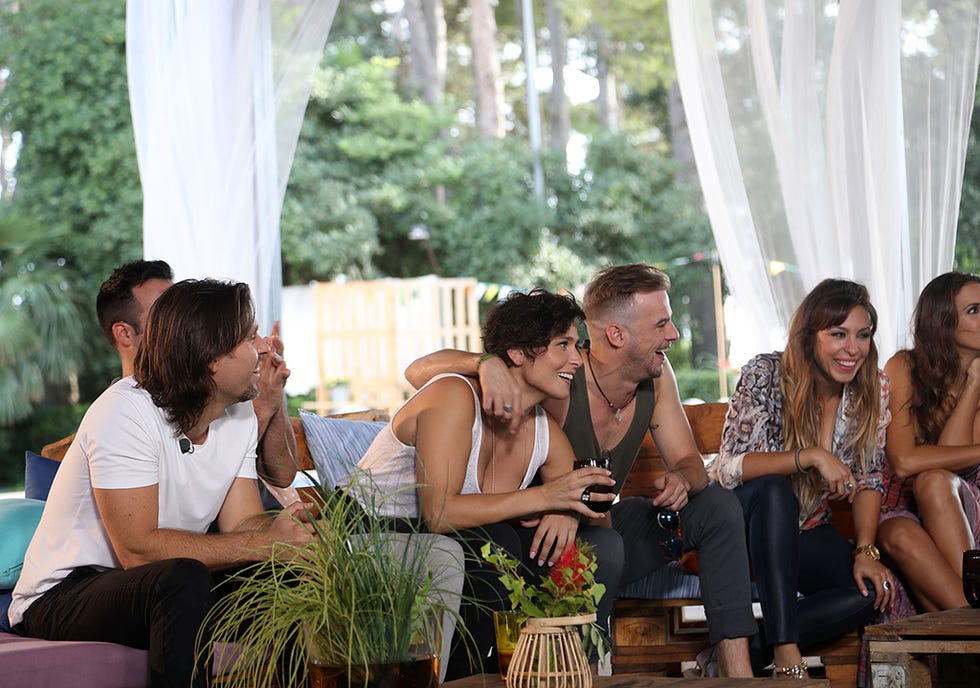Flowerpot, Sitting, Leisure, Conversation, Outdoor furniture, Curtain, Houseplant, Coffee table, 