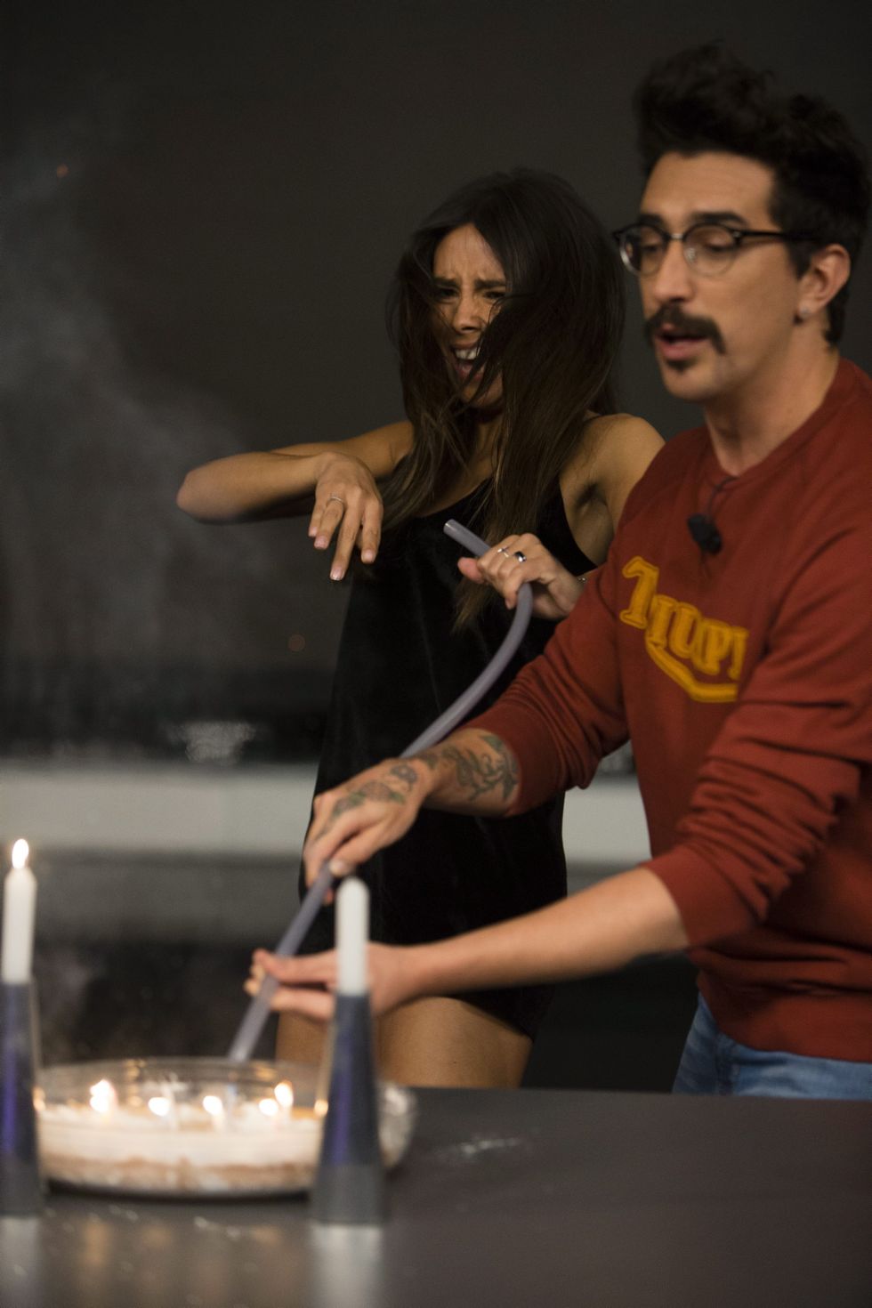 Glasses, Lighting, Facial hair, Candle, Beard, Moustache, Drum stick, Wax, Flame, Cooking, 