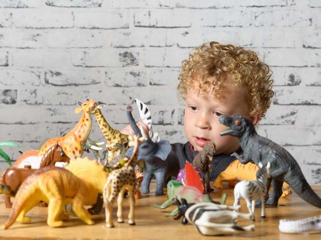 Dinosaur, Toy, Play, Organism, Child, Animal figure, Fawn, Art, 