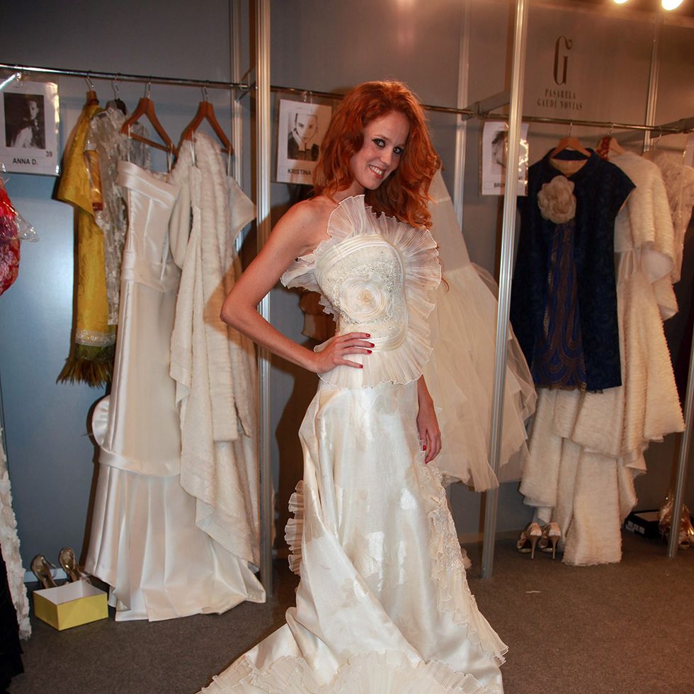 Gown, Wedding dress, Dress, Clothing, Bride, Bridal clothing, Fashion model, Bridal party dress, Photograph, Shoulder, 