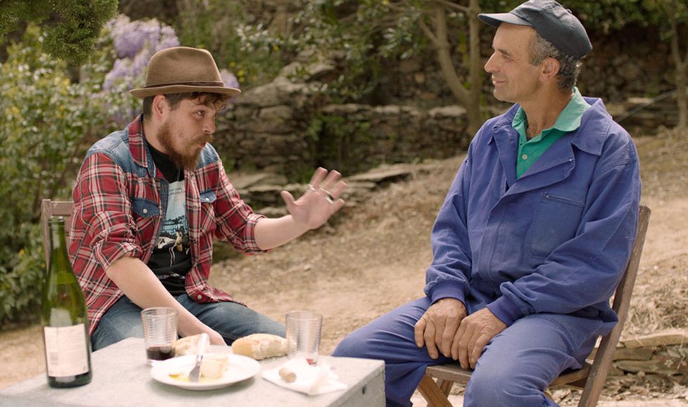 Cap, Human body, Sitting, Hat, People in nature, Headgear, Drink, Sharing, Bottle, Conversation, 