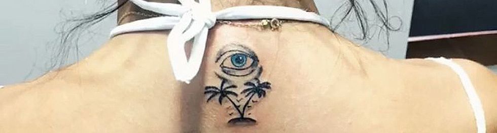 Face, Tattoo, Eyebrow, Skin, Arm, Eye, Temporary tattoo, Eyelash, Neck, Plant, 