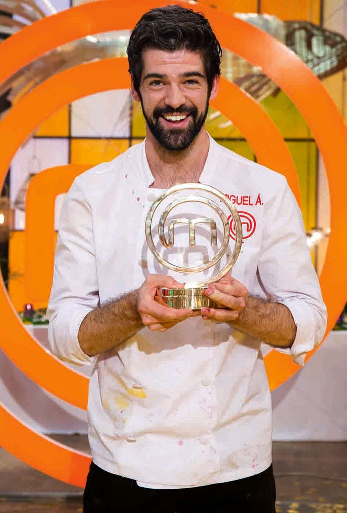 Sleeve, Human body, Facial hair, Orange, Trophy, Award, Beard, Moustache, Tooth, Bone, 