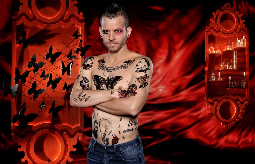 Denim, Tattoo, Chest, Trunk, Muscle, Abdomen, Barechested, Temporary tattoo, Stomach, Belt, 