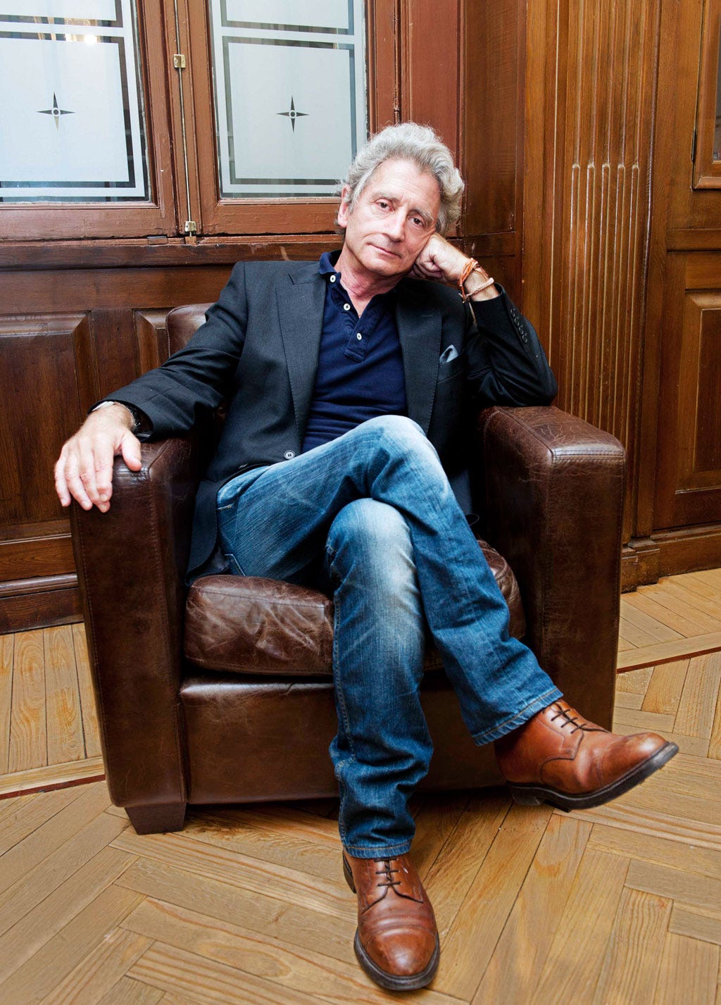 Clothing, Wood, Brown, Trousers, Jeans, Sitting, Denim, Shoe, Hardwood, Wood stain, 