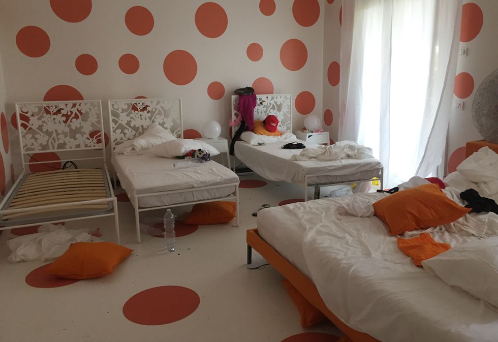 Room, Bedroom, Bed, Furniture, Orange, Interior design, Property, Bed frame, Bed sheet, Wall, 