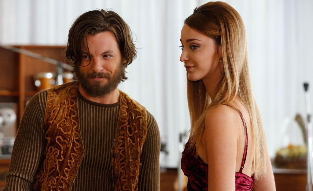 Clothing, Hairstyle, Facial hair, Outerwear, Flowerpot, Beard, Coat, Dress, Formal wear, Fashion, 