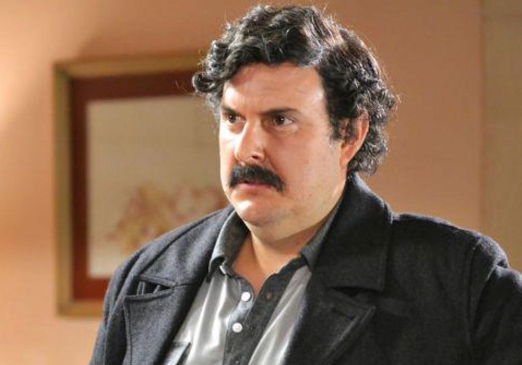 Cheek, Chin, Forehead, Eyebrow, Jacket, Collar, Picture frame, Facial hair, Leather, Portrait, 