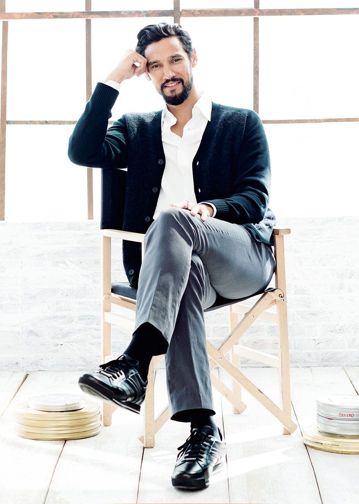 Clothing, Footwear, Trousers, Shoe, Sitting, Outerwear, Standing, Dress shirt, Style, Collar, 