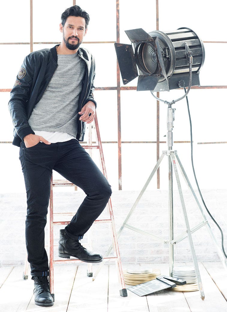 Trousers, Denim, Standing, Jeans, Camera accessory, Photography, Cool, Public address system, Street fashion, Flash photography, 