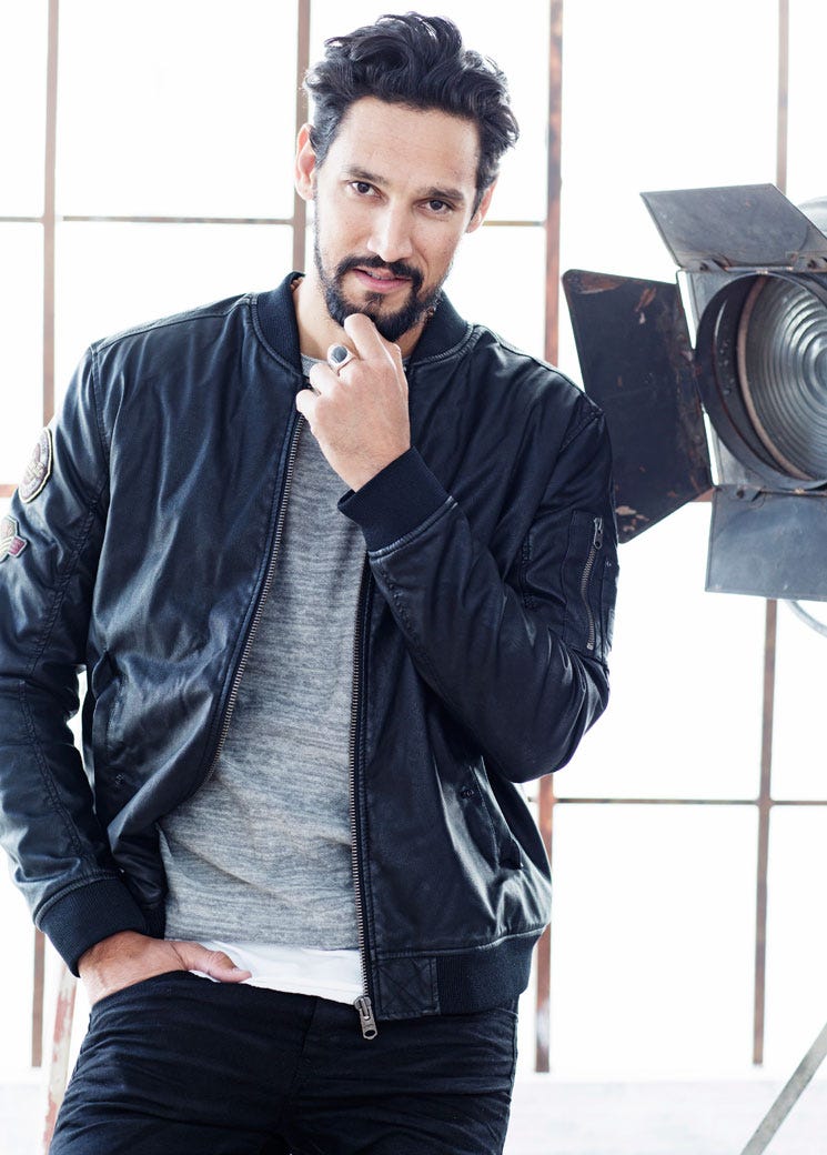 Jacket, Sleeve, Denim, Collar, Textile, Standing, Outerwear, Dress shirt, Facial hair, Style, 