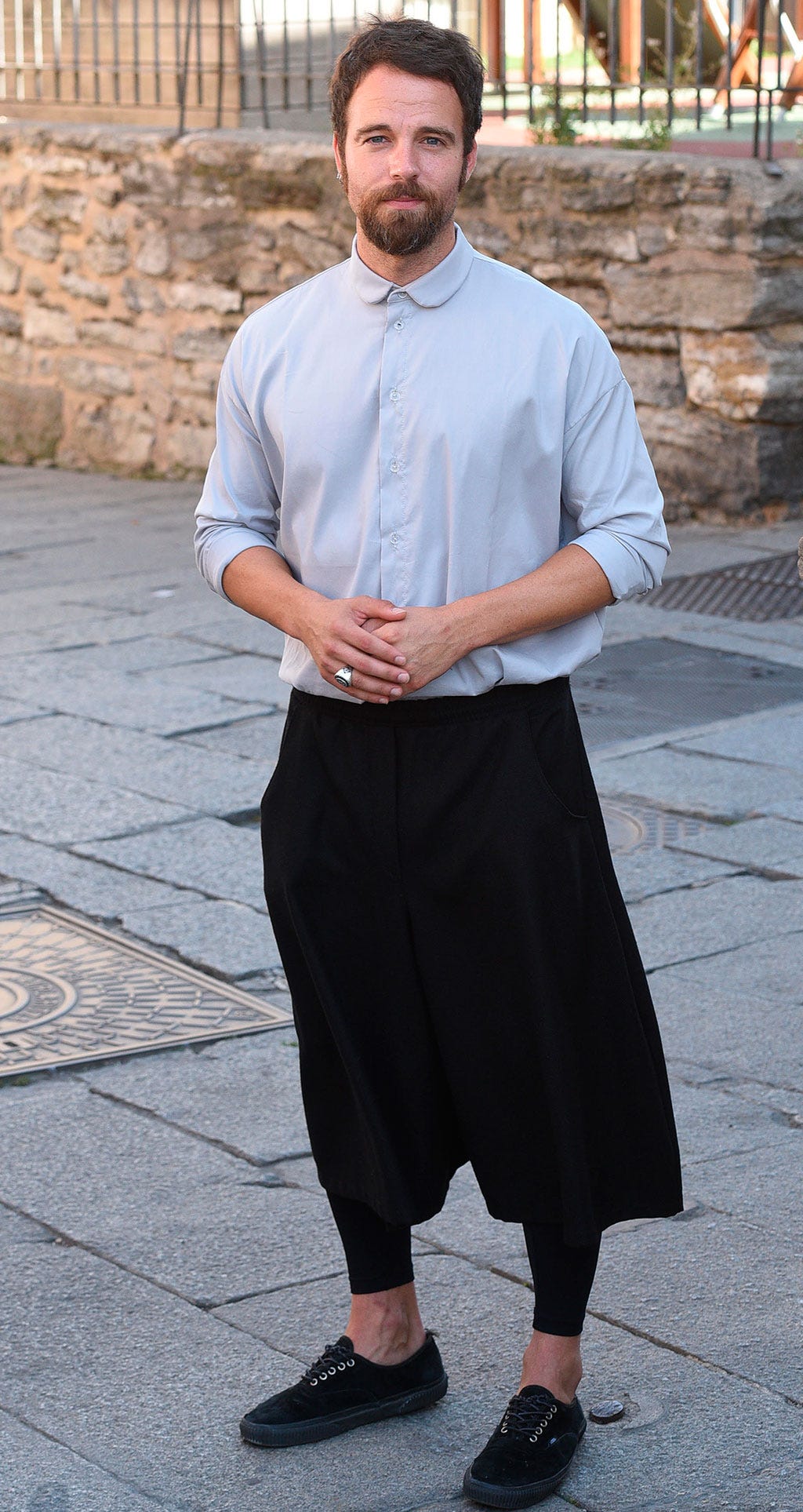 Clothing, Collar, Sleeve, Human body, Shoulder, Textile, Joint, Standing, Style, Facial hair, 