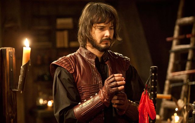 Beard, Facial hair, Candle holder, Candle, Flame, Fire, Acting, Fictional character, Leather, Leather jacket, 