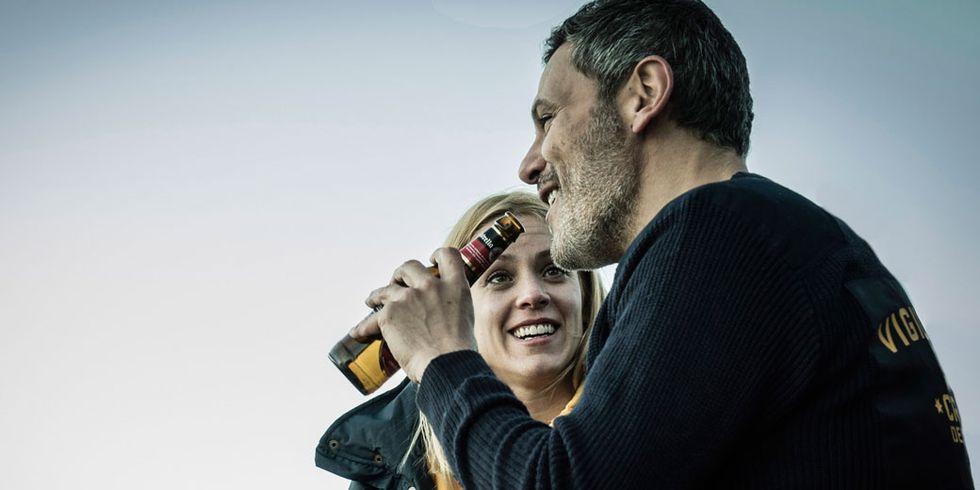 Drink, Bottle, Tooth, Facial hair, Beard, Glove, Beer, Drinking, Laugh, Gesture, 