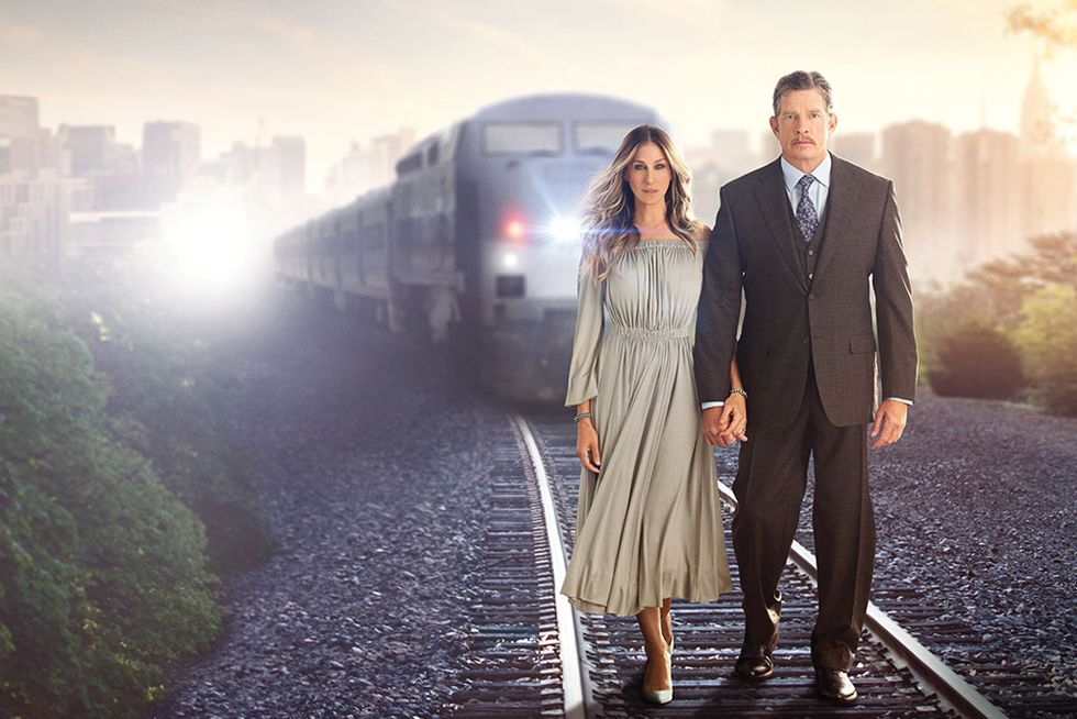 Photograph, Standing, Coat, Atmospheric phenomenon, People in nature, Formal wear, Dress, Travel, Rolling stock, Beauty, 