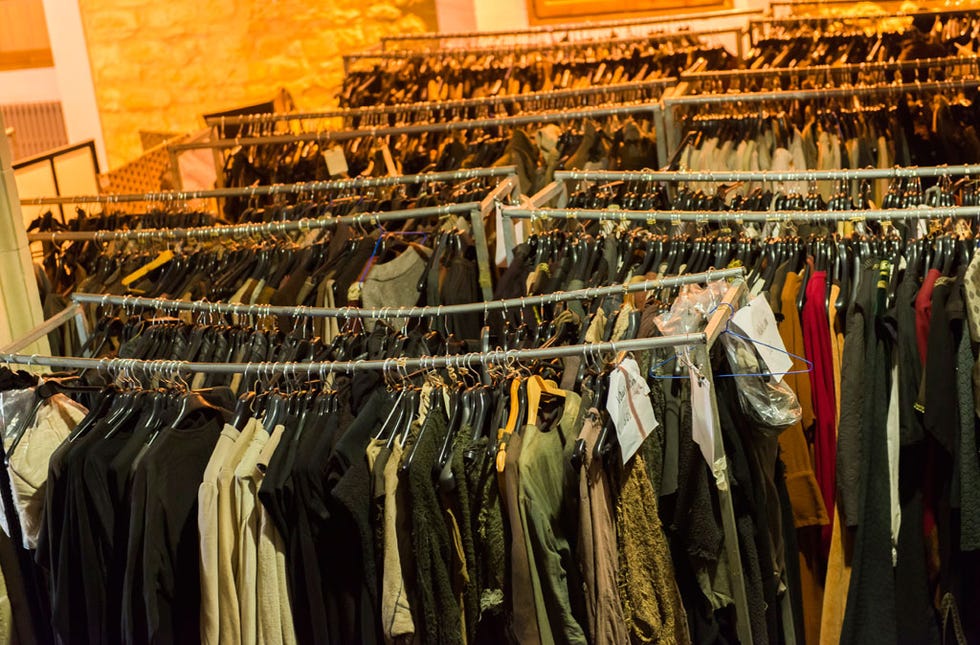 Yellow, Textile, Clothes hanger, Collection, Boutique, Fashion design, Outlet store, Dry cleaning, Home accessories, 