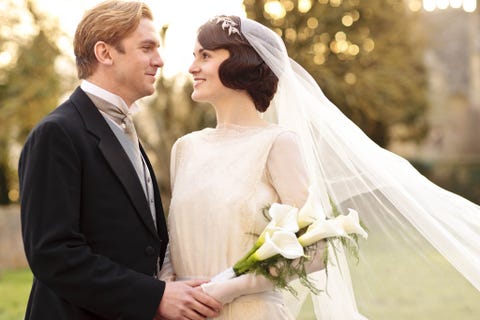 Clothing, Bridal veil, Veil, Bridal clothing, Coat, Petal, Bride, Wedding dress, Dress, Photograph, 