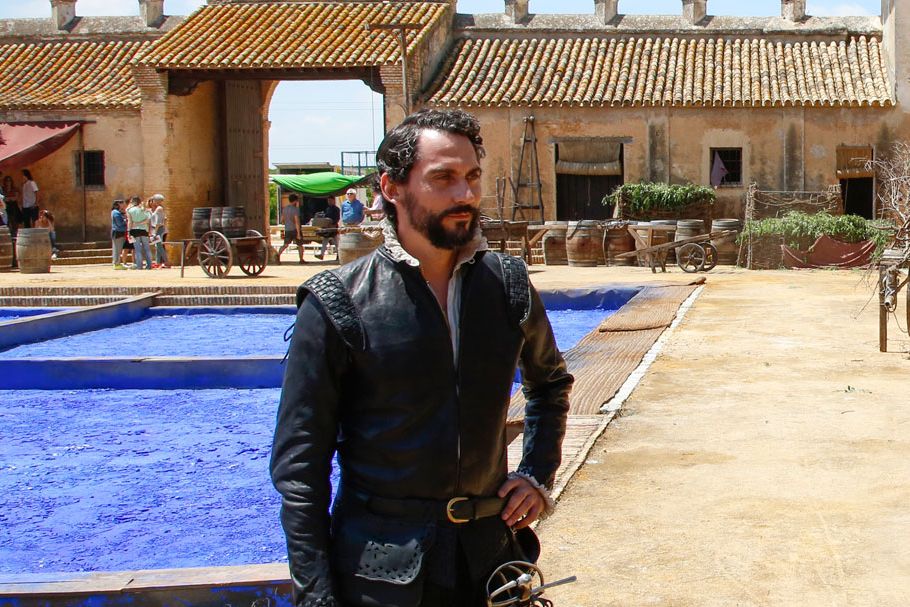 Beard, Roof, Facial hair, Moustache, Shade, Water feature, Courtyard, Hacienda, Village, Swimming pool, 