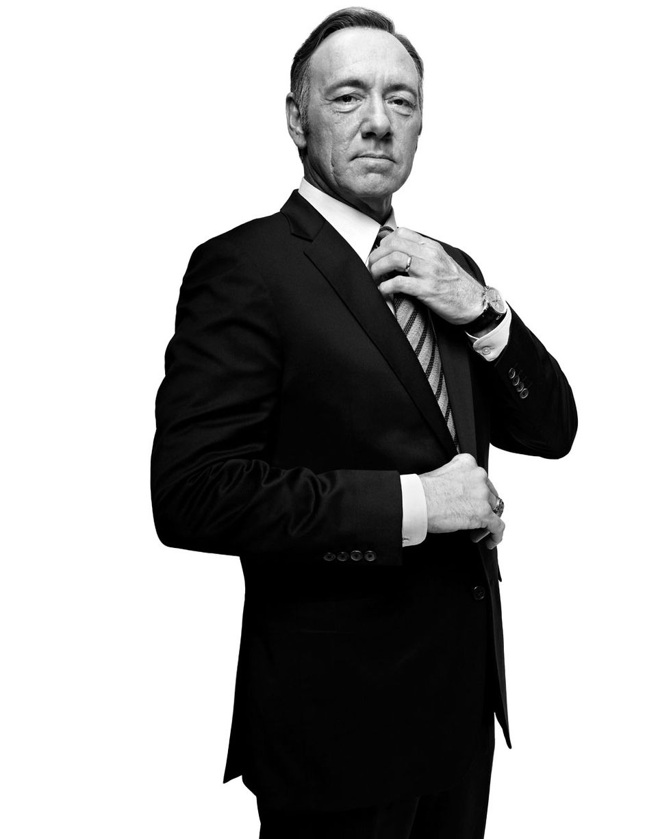 Suit, Black, Formal wear, Standing, Tuxedo, Businessperson, White-collar worker, Black-and-white, Photography, Gesture, 