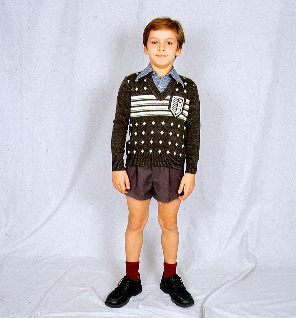 Clothing, White, Fashion, Fashion model, Footwear, Standing, Outerwear, Neck, Shorts, Pattern, 