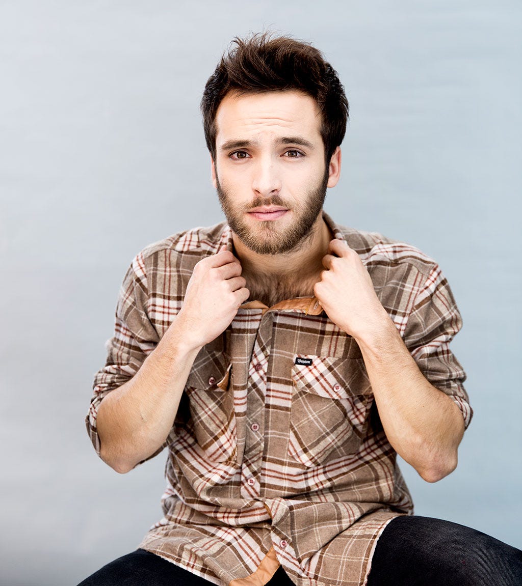 Hair, Chin, Hairstyle, Cool, Facial hair, Cheek, Sitting, Forehead, Model, Fashion, 