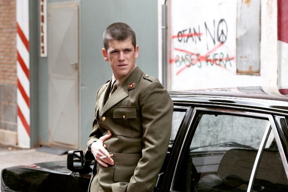 Uniform, Vehicle, Car, Photography, Family car, Military uniform, Street fashion, Jacket, City car, 