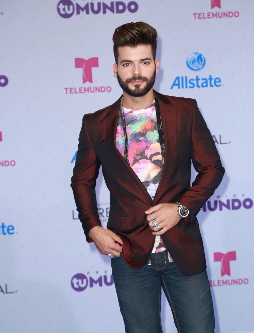 Outerwear, Jeans, Coat, Denim, Facial hair, Style, Collar, Blazer, Fashion, Logo, 
