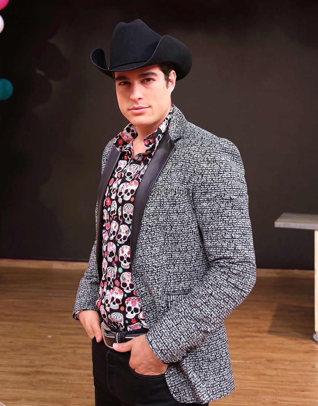 Clothing, Hat, Dress shirt, Collar, Coat, Sleeve, Trousers, Shirt, Standing, Outerwear, 