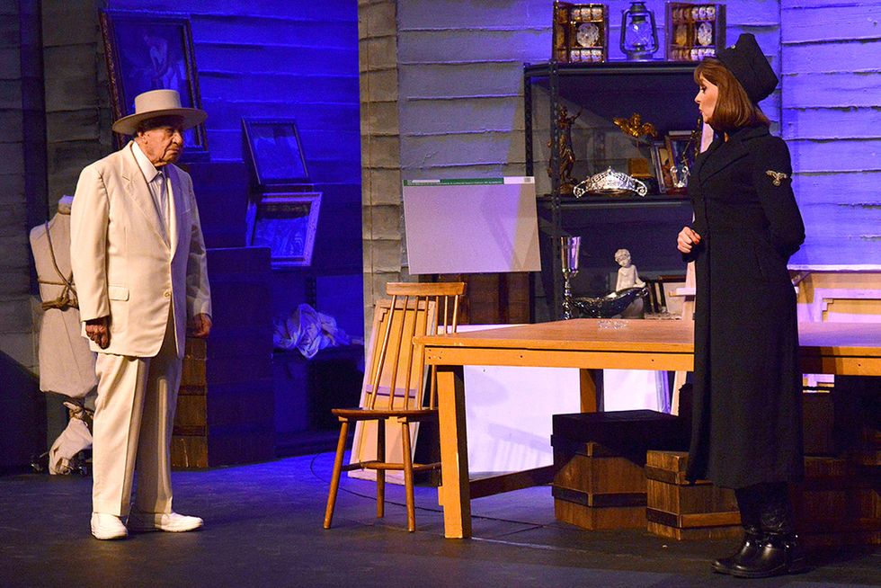Lighting, Human body, Hat, Table, Suit trousers, Sun hat, Picture frame, Drama, Stage, heater, 
